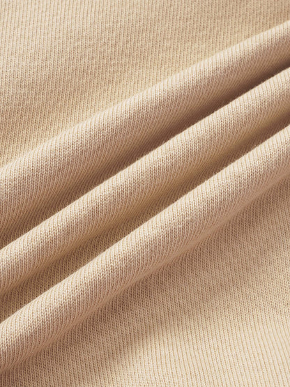 Girls Tops beige ribbed knit fabric close-up, soft textured material