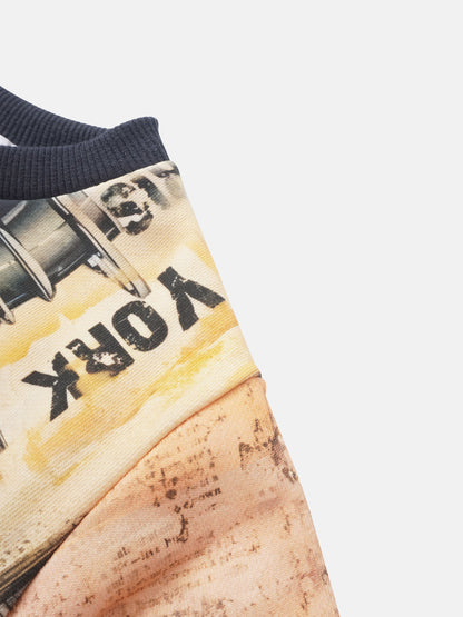Skyscraper Sweatshirt for boys by Adee; navy ribbed cuff with cityscape graphic in warm beige and yellow tones.