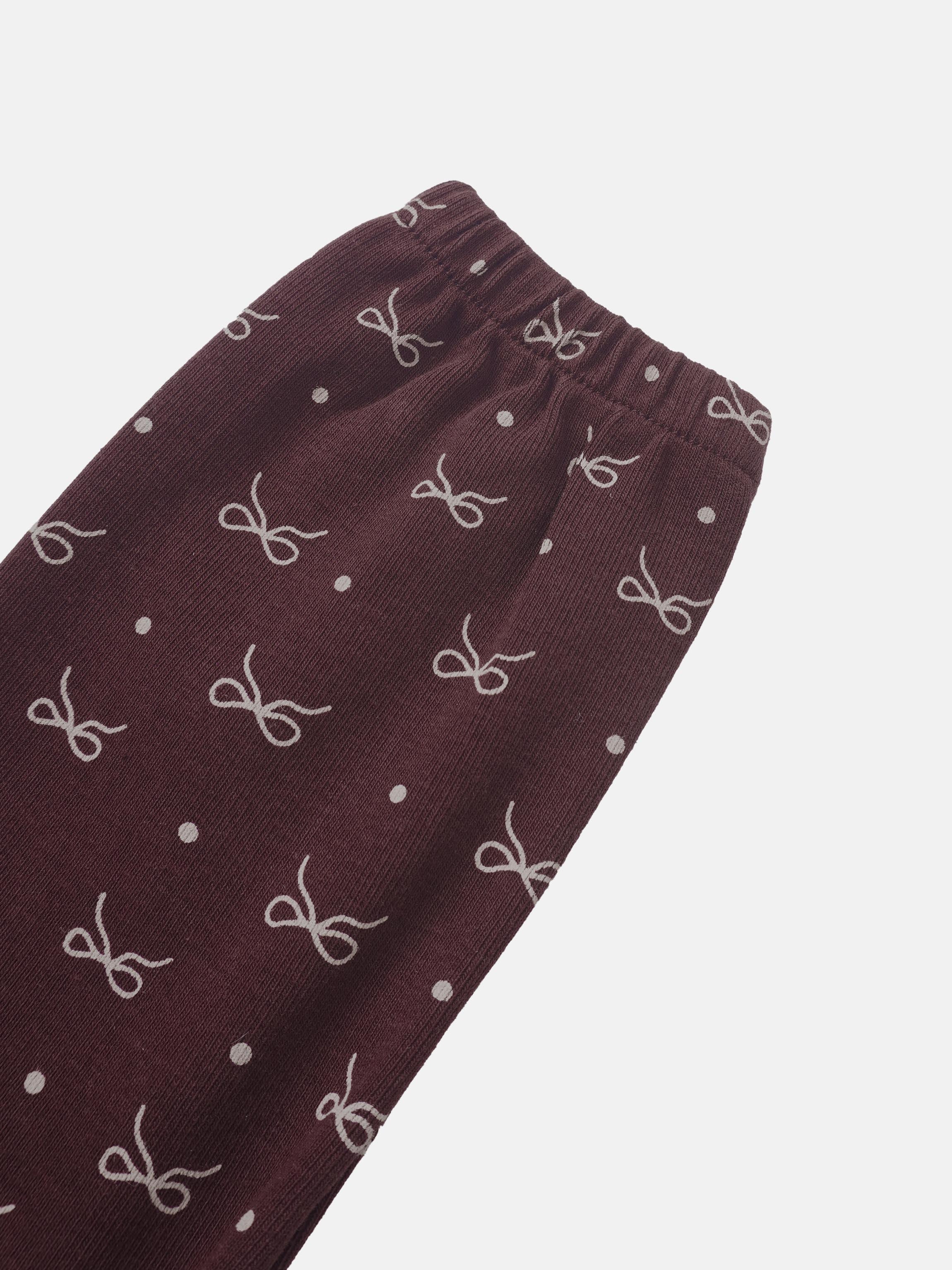 Burgundy Bow Set fabric for little girls; white bow motifs and dotted print on knit material.