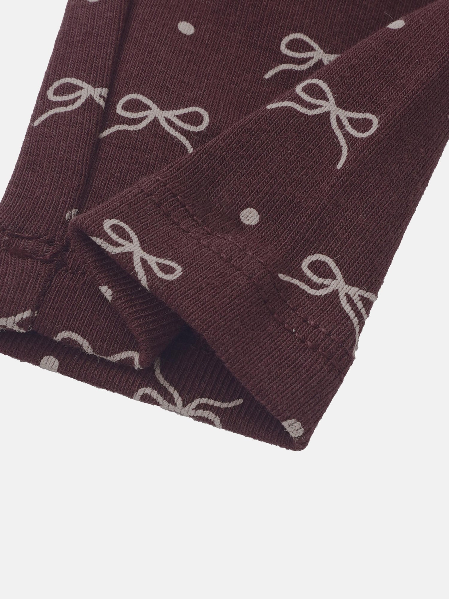 Little Girls Set by Adee in burgundy knit with white bow pattern