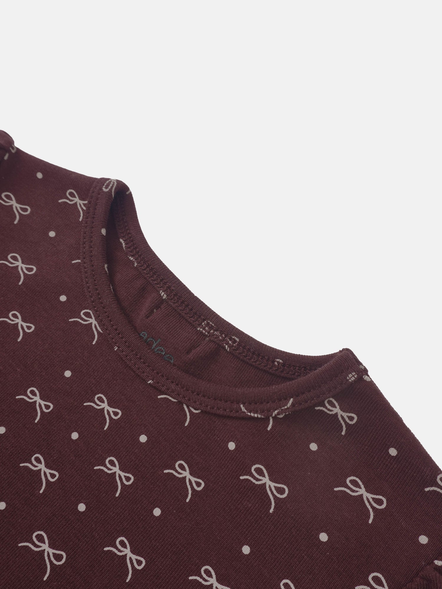 Girls burgundy T-shirt with white bow pattern and dot print