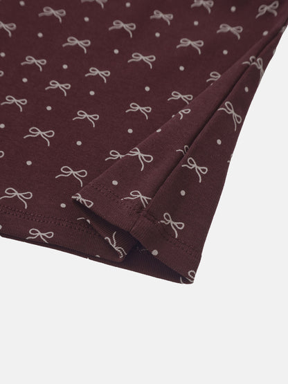 Burgundy Bow T‑Shirt for girls with white bow prints and polka dot accents.