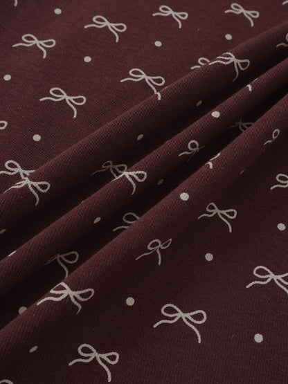 Adee Burgundy Bow T-Shirt for girls; burgundy fabric with white bow motifs.