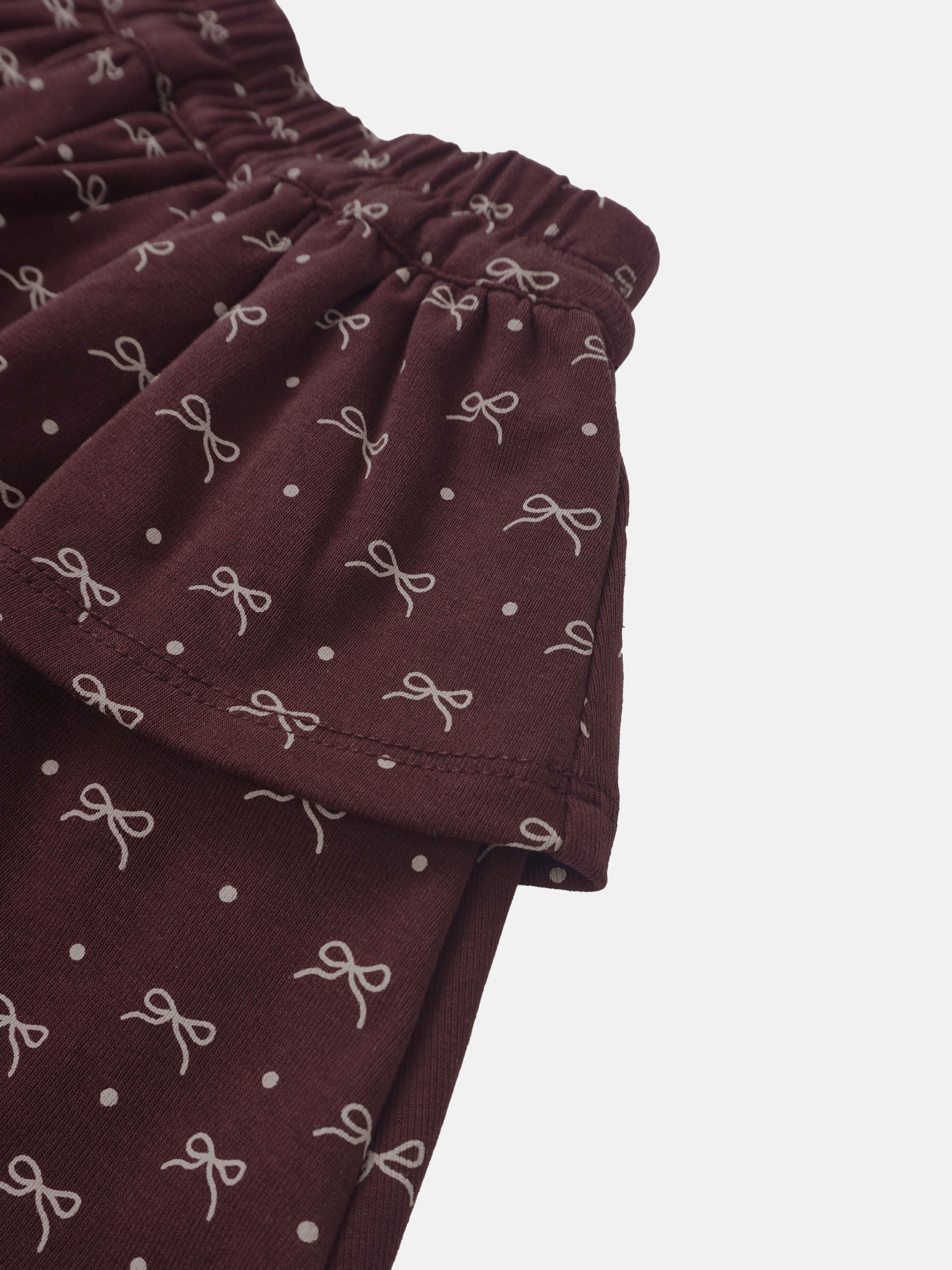 Adee Burgundy Bow Layered Skirt for Girls, burgundy fabric with white bow prints and dots.