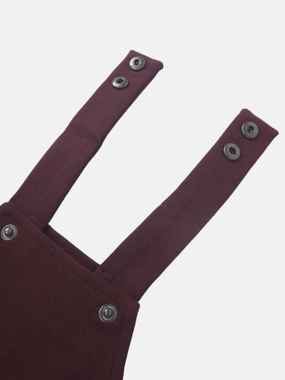 Non ribbed burgundy overalls by Adee; unisex basics with metal snap-button straps