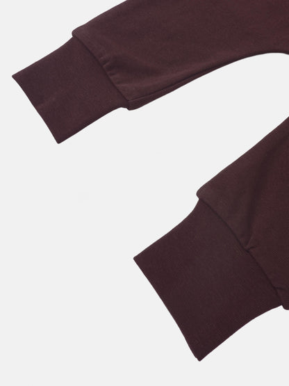 Non Ribbed Overalls Burgundy by Adee; unisex basics fabric close-up showing cuffed sleeves