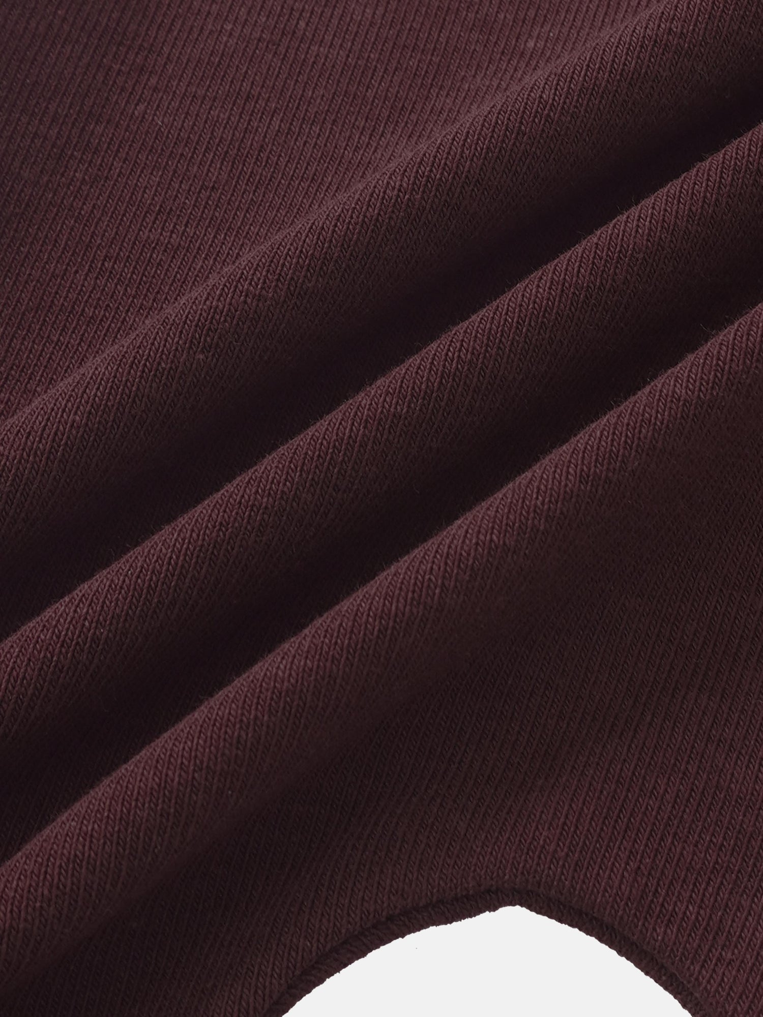 Overalls burgundy ribbed fabric close up texture detail