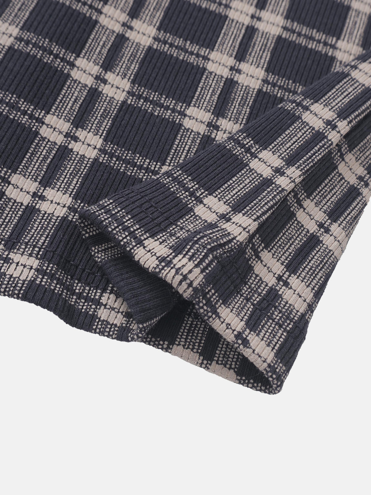 Boys plaid pajamas by Adee in blue with beige accents, folded