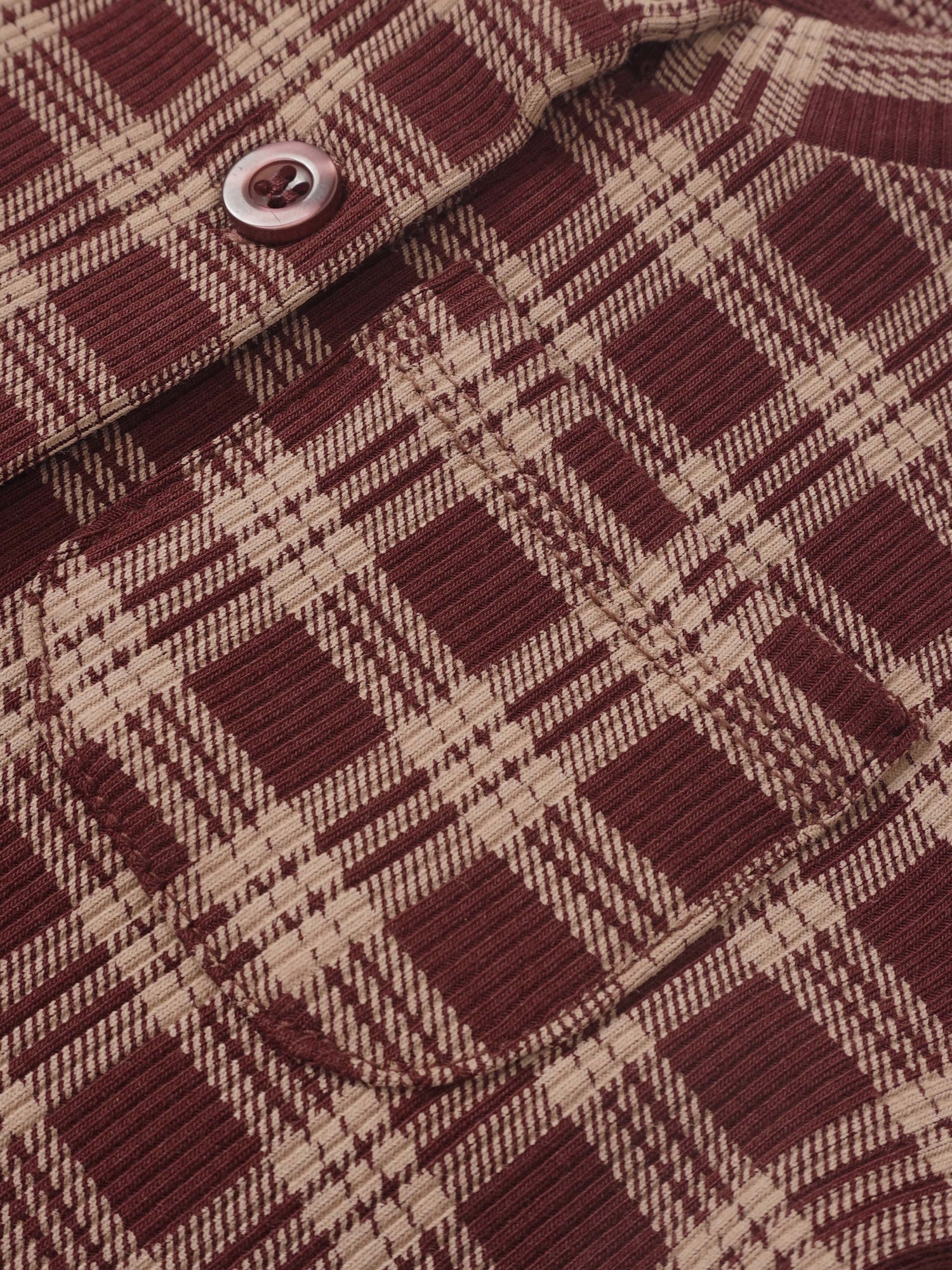 Girls plaid burgundy Adee pajamas close-up of textured fabric and button