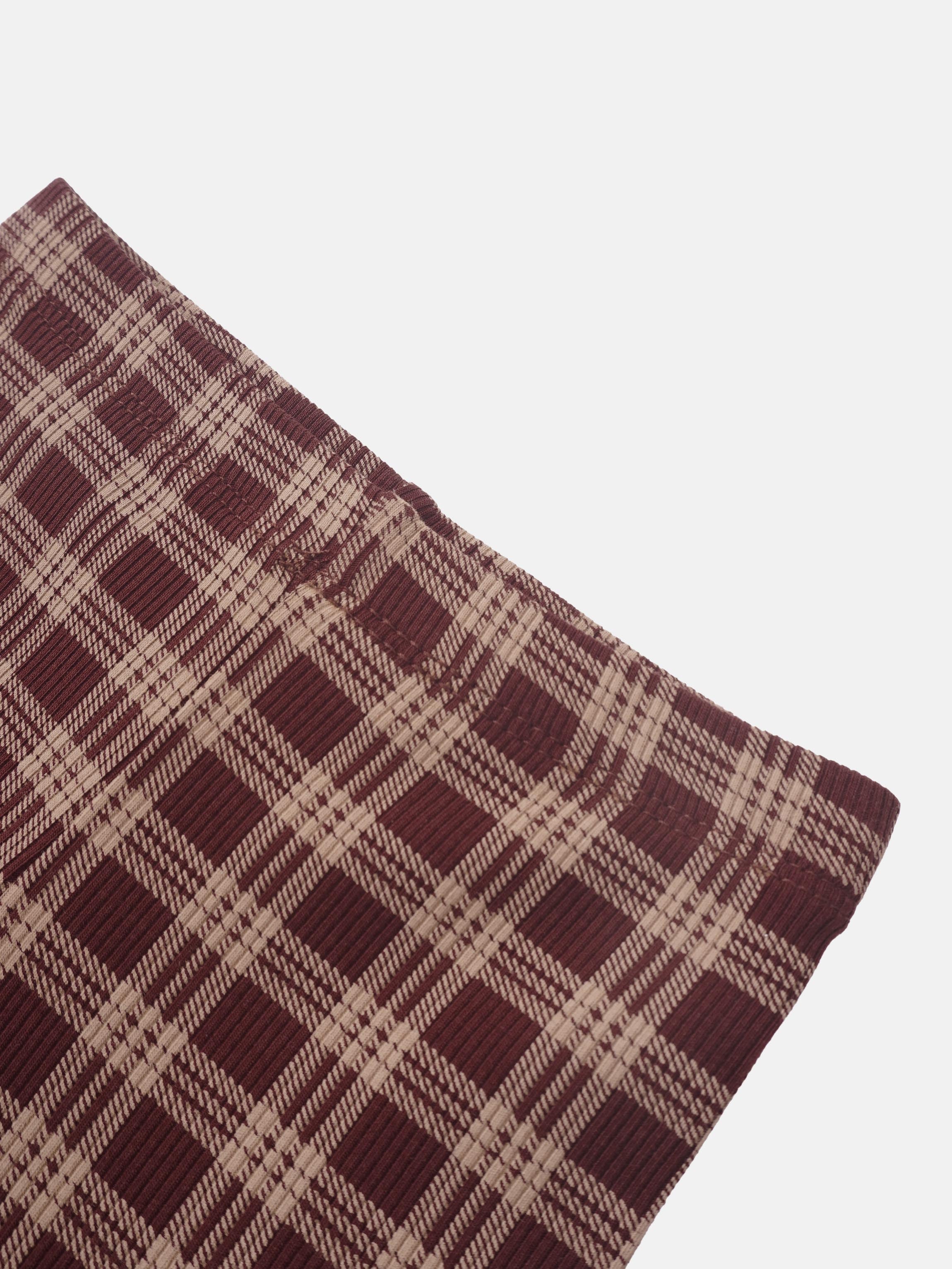 Plaid Pajamas for girls fabric close-up, burgundy pattern