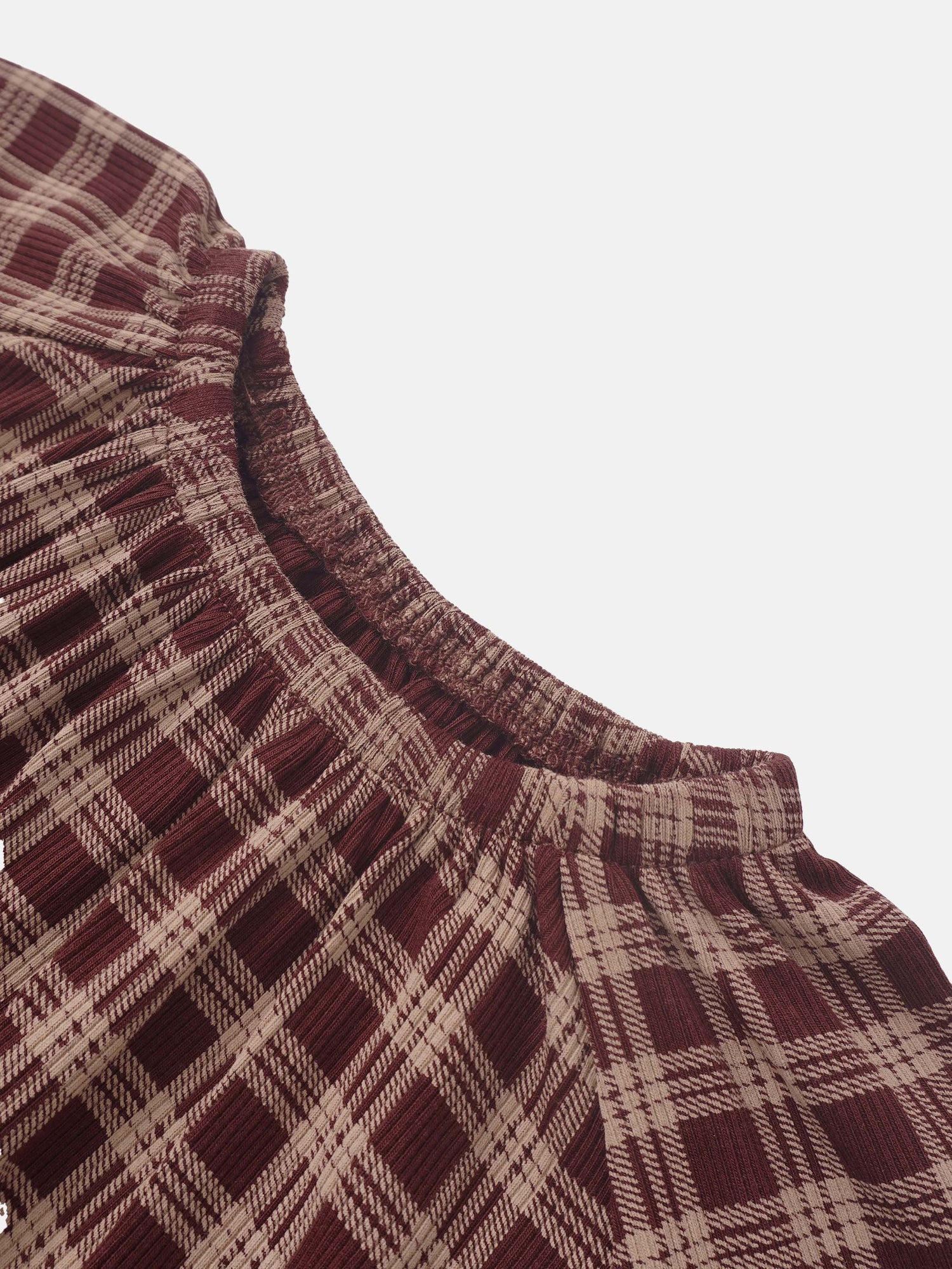 Plaid burgundy girls nightgown close-up fabric texture