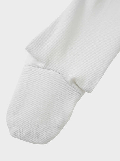 Mini Gallery Stretchy boys jumpsuit sleeve in white ribbed knit fabric.