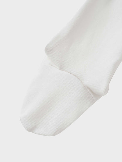 Girls Stretchies white ribbed sock cuff close-up, knit fabric texture visible