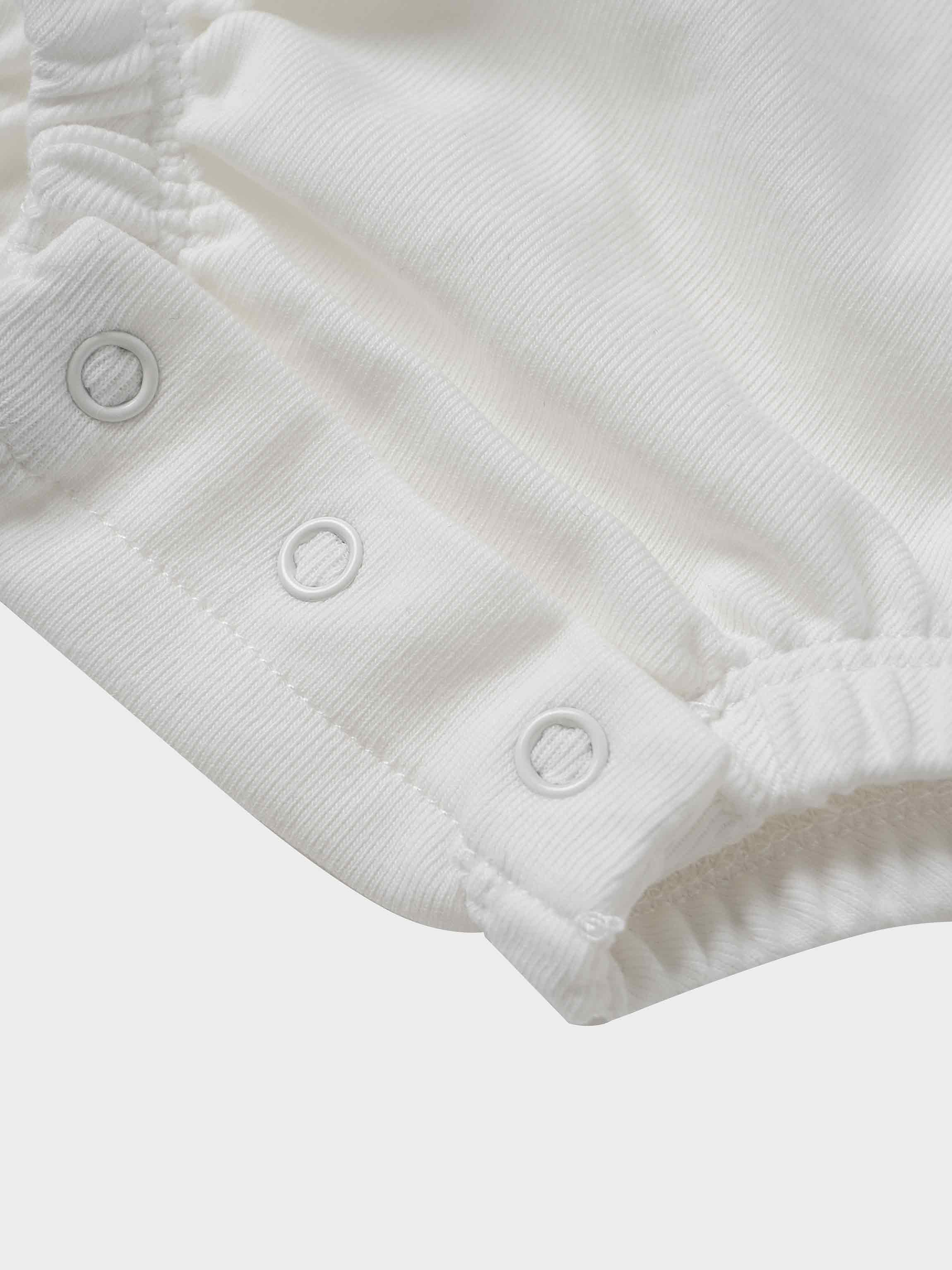 Mini Gallery Romper for girls, white fabric with snap closures
