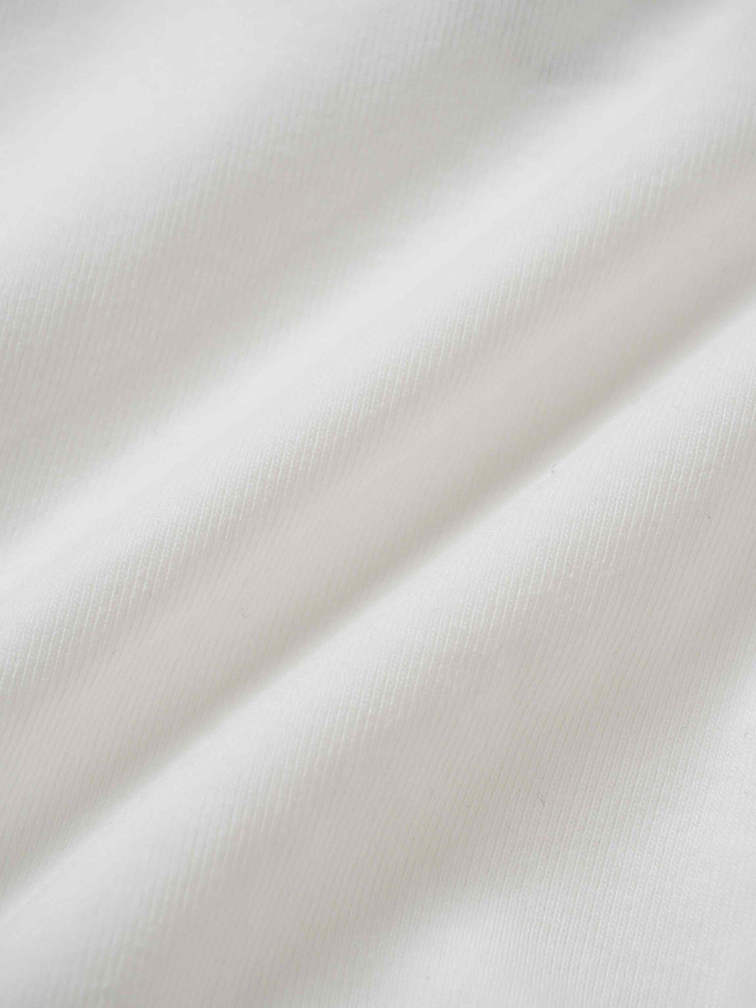 Mini Gallery Romper white fabric close-up for baby girls