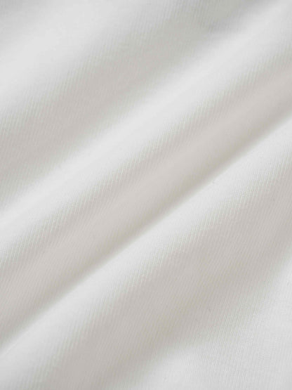 Mini Gallery Romper white fabric close-up for baby girls