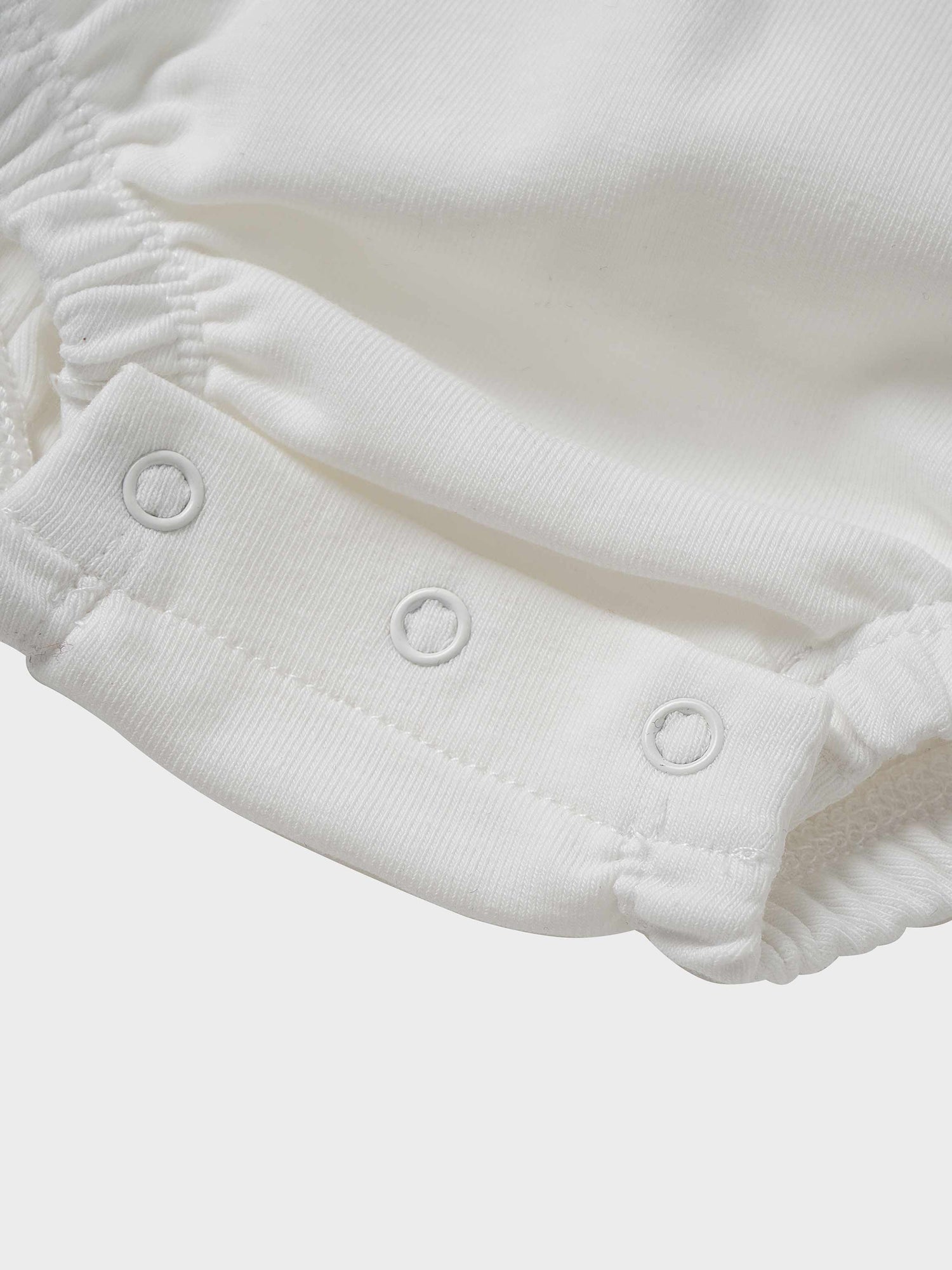 Mini Gallery Romper white baby boys romper with snap buttons and elastic cuffs