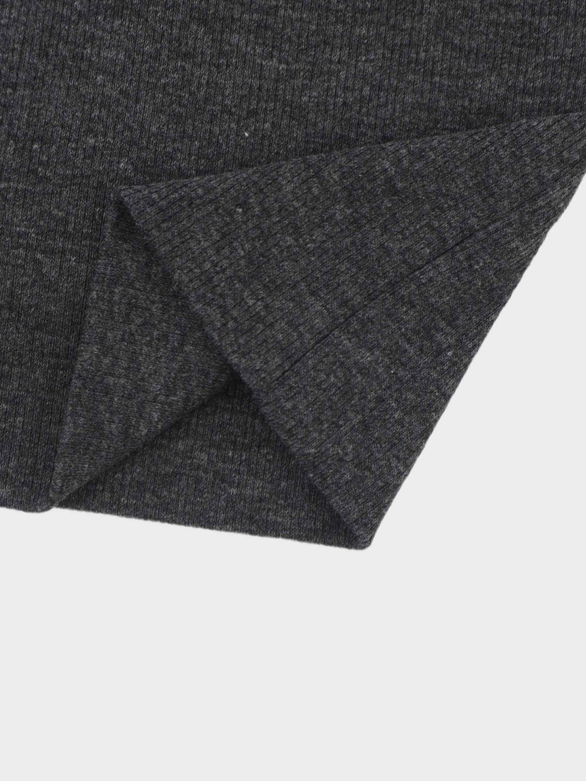 Thin ribbed baby hat detail.