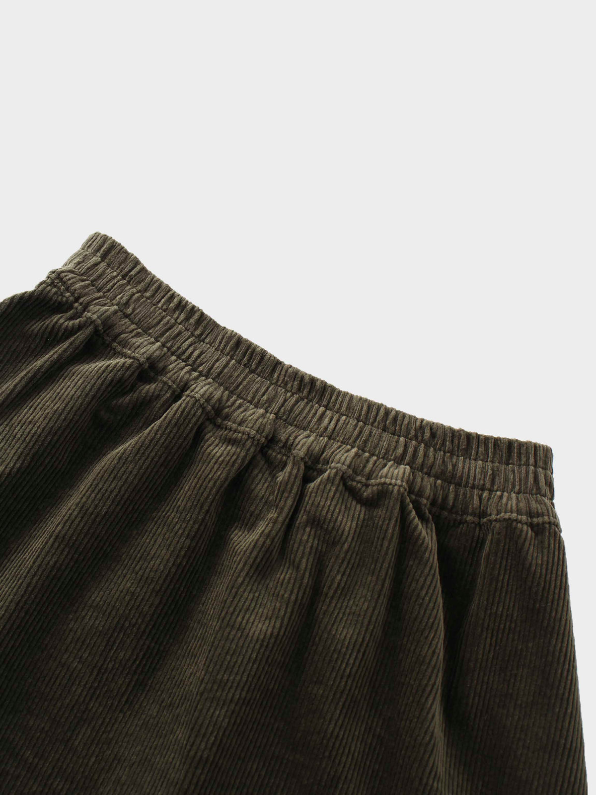 Forest green corduroy skirt with elastic waistband and gentle gathers.