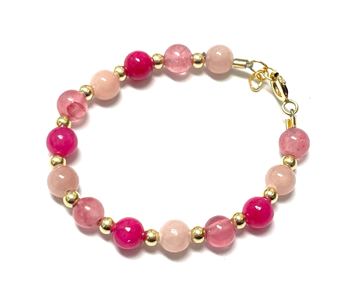 Three Color Bracelet with pink, rose, and fuchsia beads, gold spacers, and a clasp