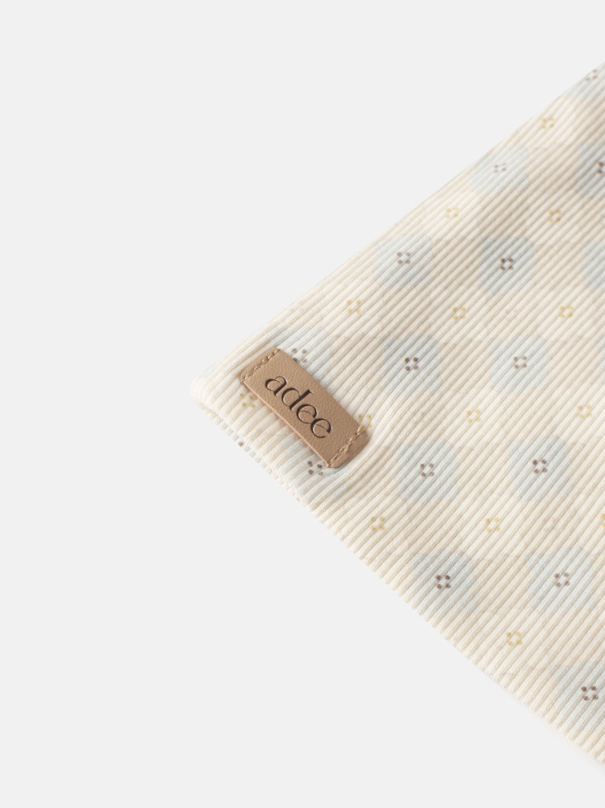 Little Button Beanie Blue for boys by Adee; striped fabric with tiny cross-stitch motifs and a leather patch