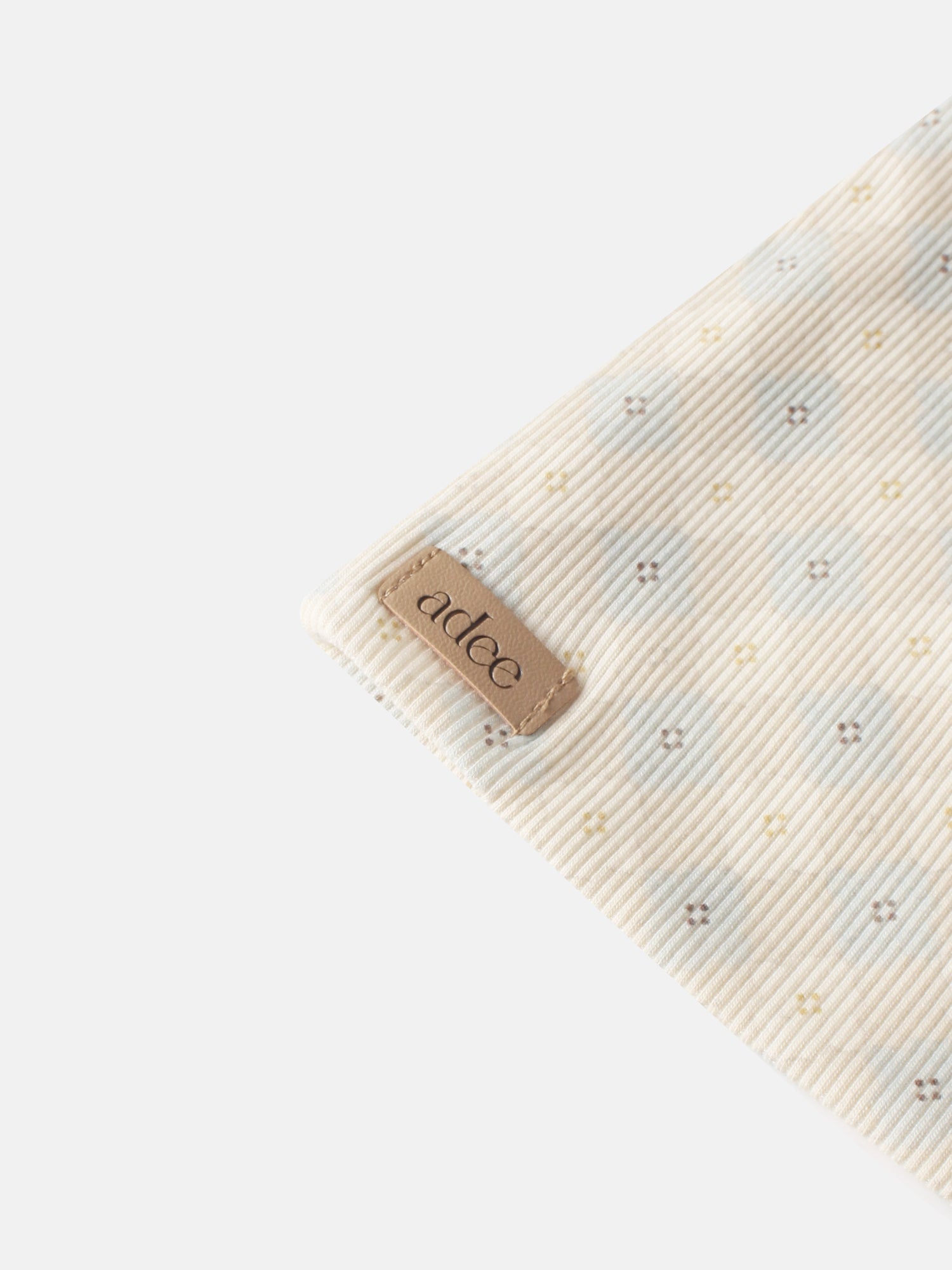 Little Button Beanie Blue for boys by Adee; striped fabric with tiny cross-stitch motifs and a leather patch