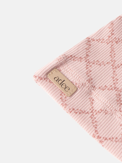 Pink leaf hat for girls by Adee, ribbed knit with a beige brand tag.