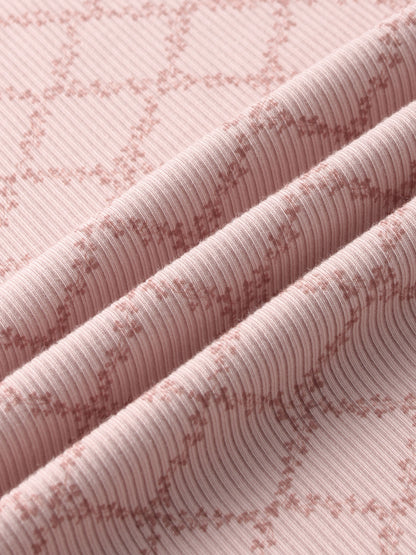 Pink Leaf Stretchy girls stretchies by Adee, ribbed knit fabric with leaf pattern.