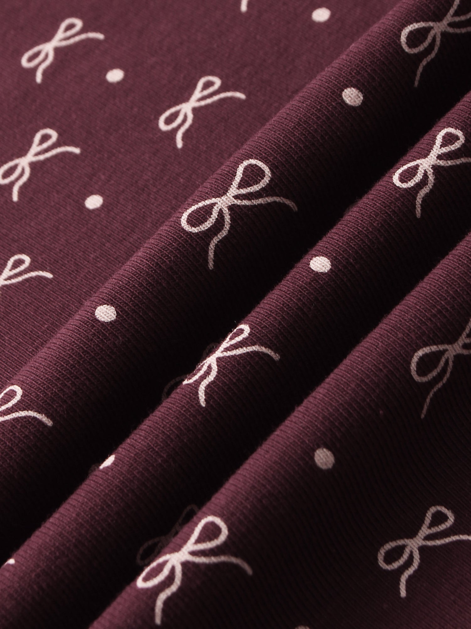 Adee Burgundy Bow Blanket; girls swaddle blanket in burgundy with white bows and dots.