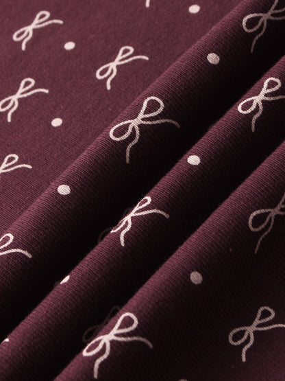 Adee Burgundy Bow Blanket; girls swaddle blanket in burgundy with white bows and dots.