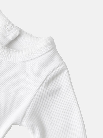 Legacy Stitch White Layette Set, white ribbed knit fabric close-up