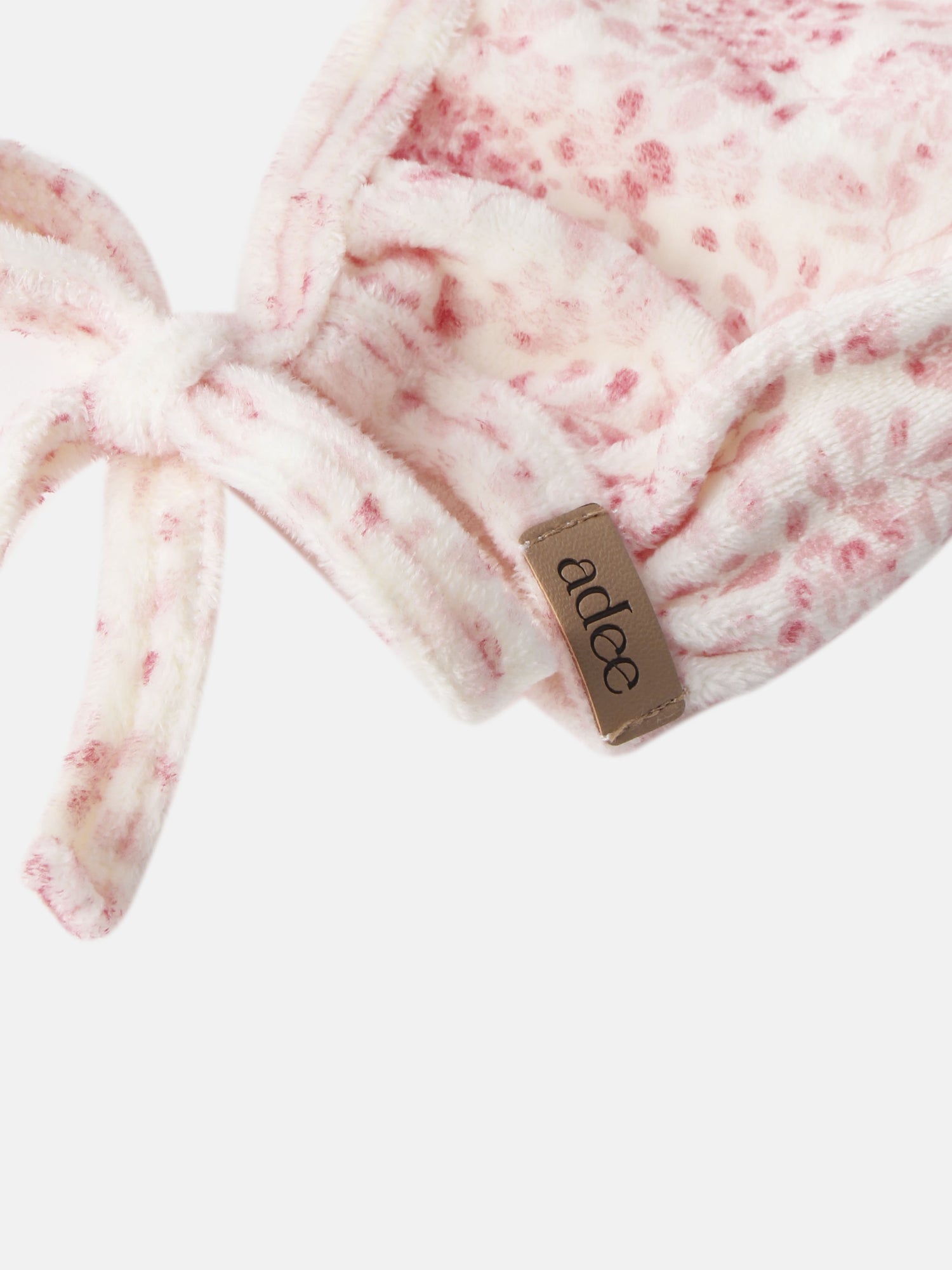 Two Tone Floral Bonnet for girls by Adee; plush pink and white fabric with ties.
