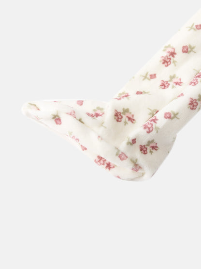 Tiny Blossom Stretchy Girls Stretchies, white fabric with pink floral print.