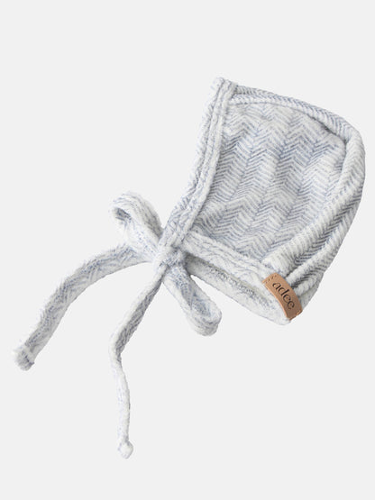 Heritage Herringbone Bonnet for boys in blue and white with tie strings and Adee brand tag.