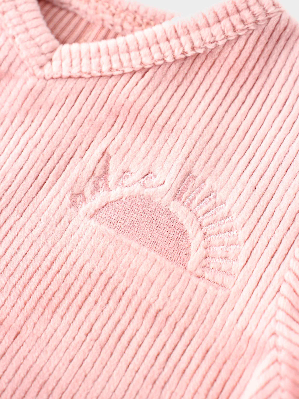 Ribbed velour pajama for girls in pink with sunburst embroidery detail