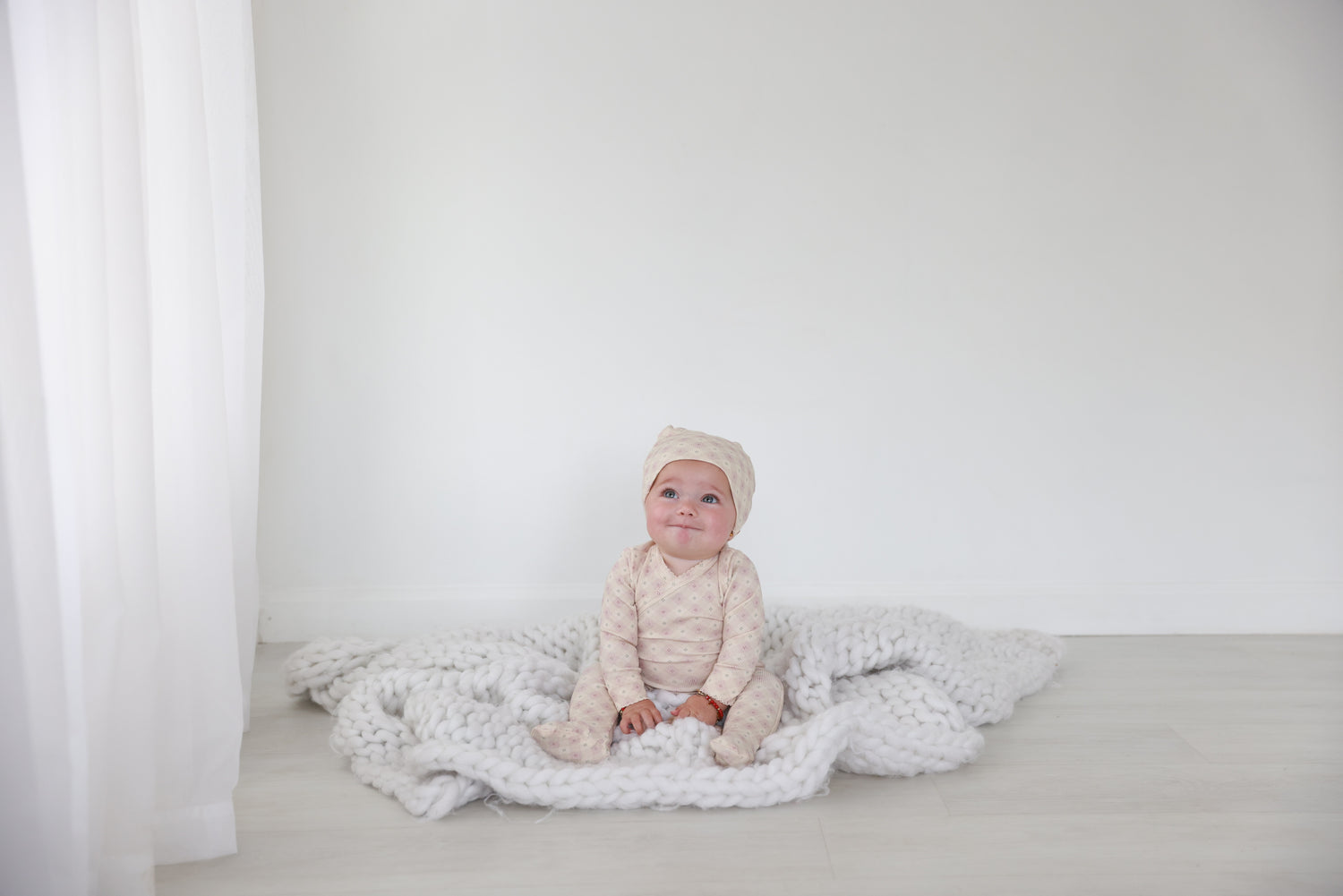 Little Button Stretchy Pink girls stretchies by Adee; soft pink knit fabric on white backdrop.