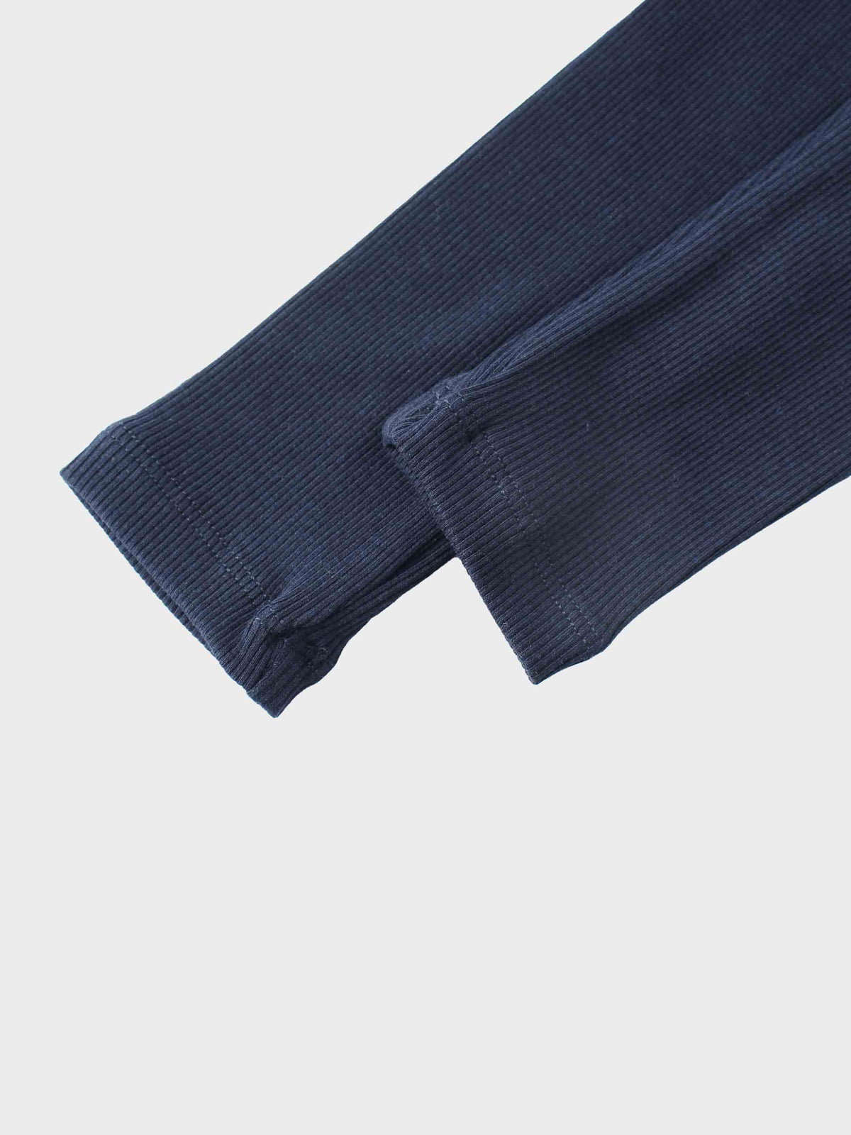 Ribbed legging set for little girls in navy with cuffed ankles.