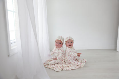 Tiny Blossom Stretchy girls stretchies in floral print, Adee brand, worn by twin babies