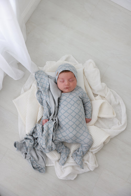 Blue Leaf Stretchy by Adee; boys baby outfit with light-blue geometric leaf pattern.