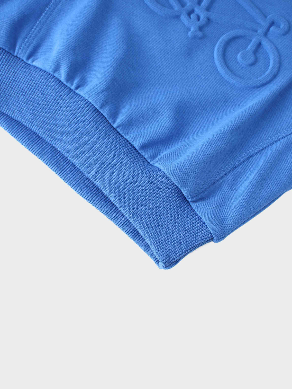 Royal blue bike sweatshirt with embossed bicycle motif and ribbed cuffs.