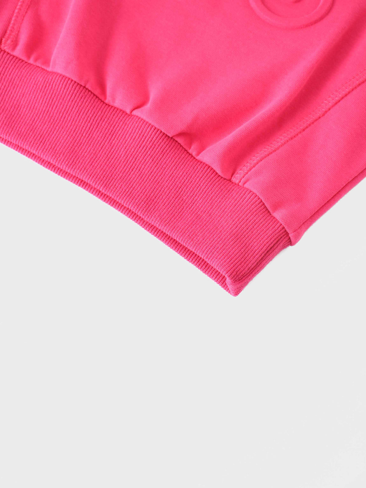 Bike Sweatshirt - Neon Pink: sleeve close-up with ribbed cuff.
