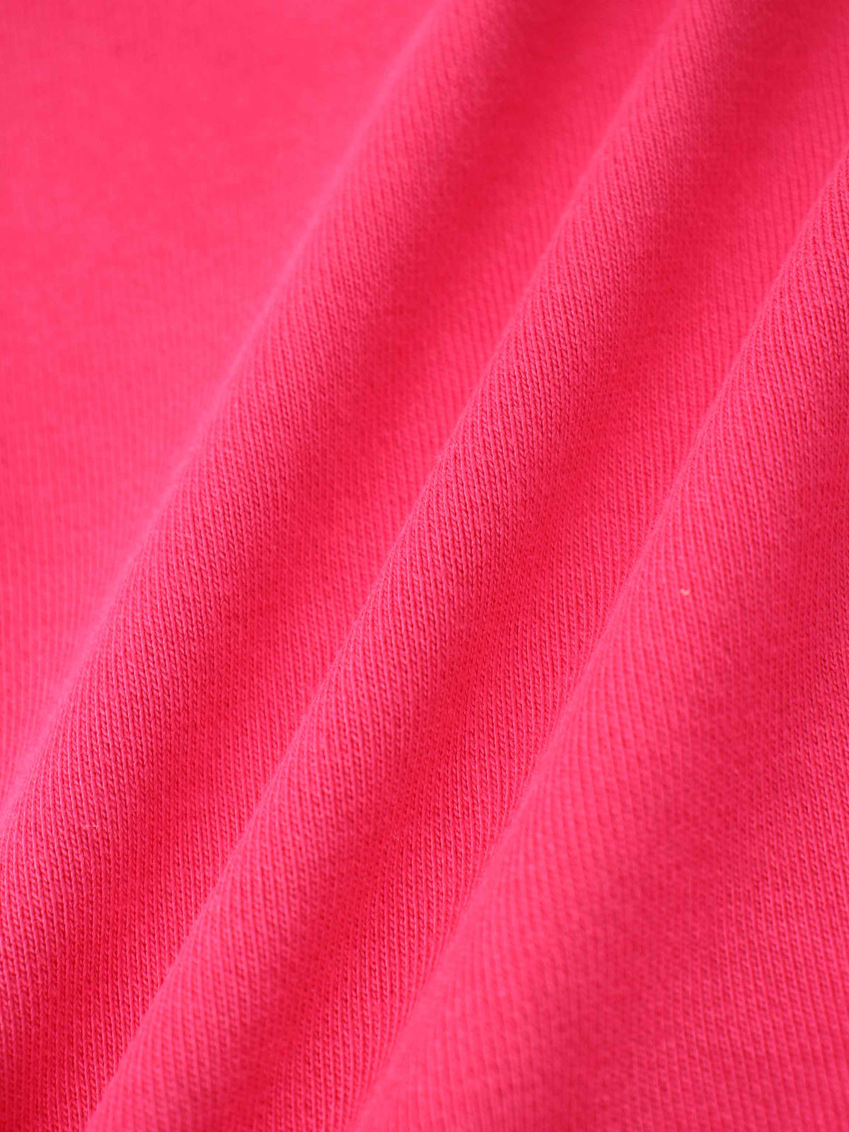 Neon pink Bike Sweatshirt fabric close-up with knit texture.