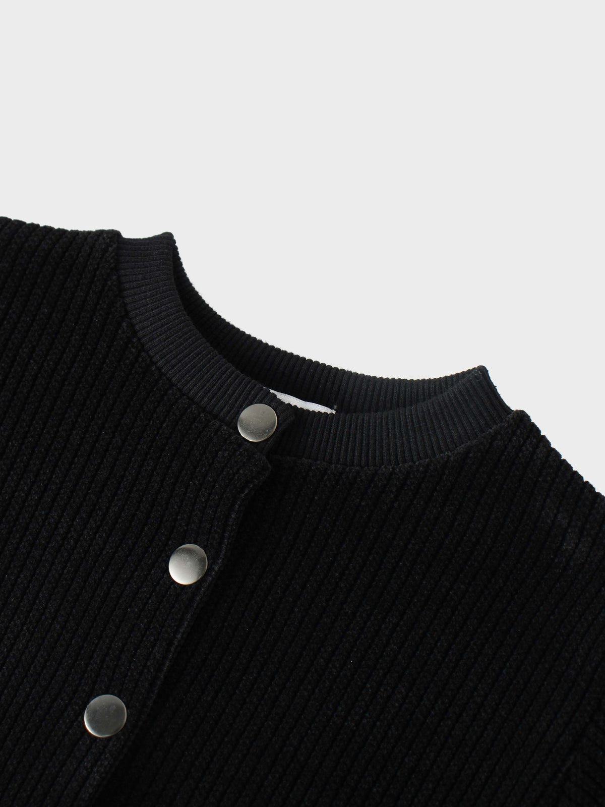 Corduroy Jacket for girls in black by Adee with silver snap buttons and ribbed collar.