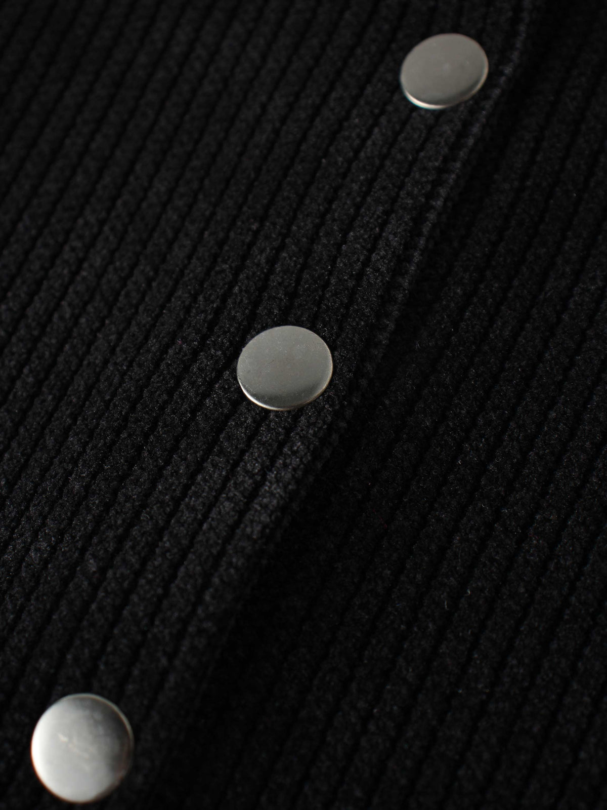 Corduroy jacket, black; Adee girls top with silver metal snap buttons.