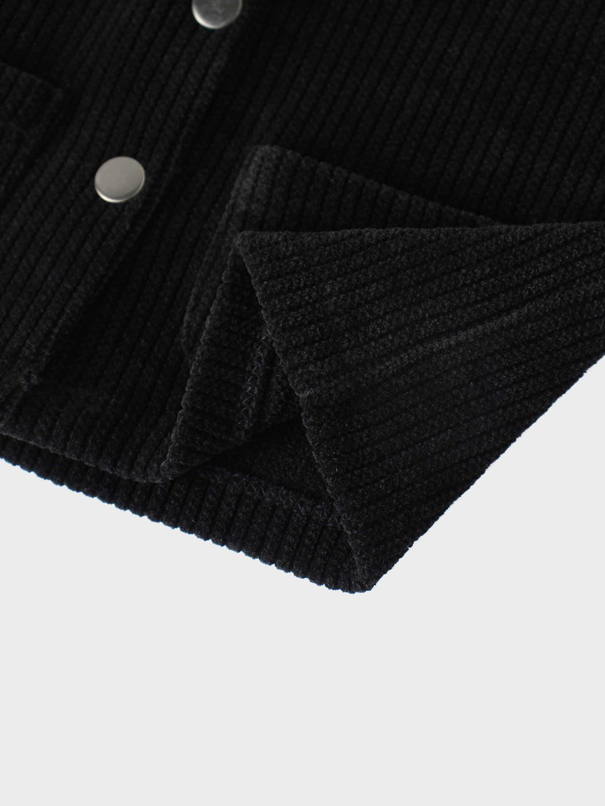 Corduroy jacket black for girls by Adee; close-up of textured fabric and metal snaps