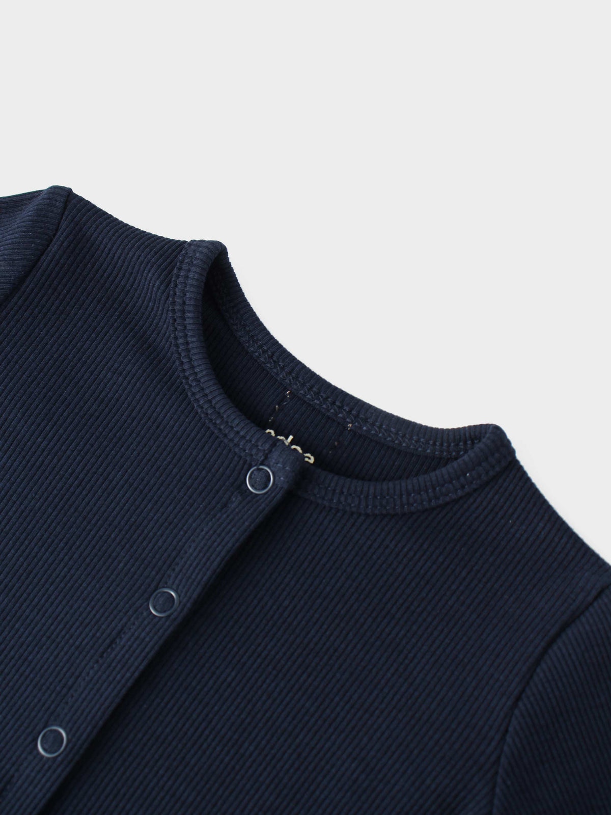 Thin ribbed cardigan navy by Adee; unisex dressy top with front snap buttons.