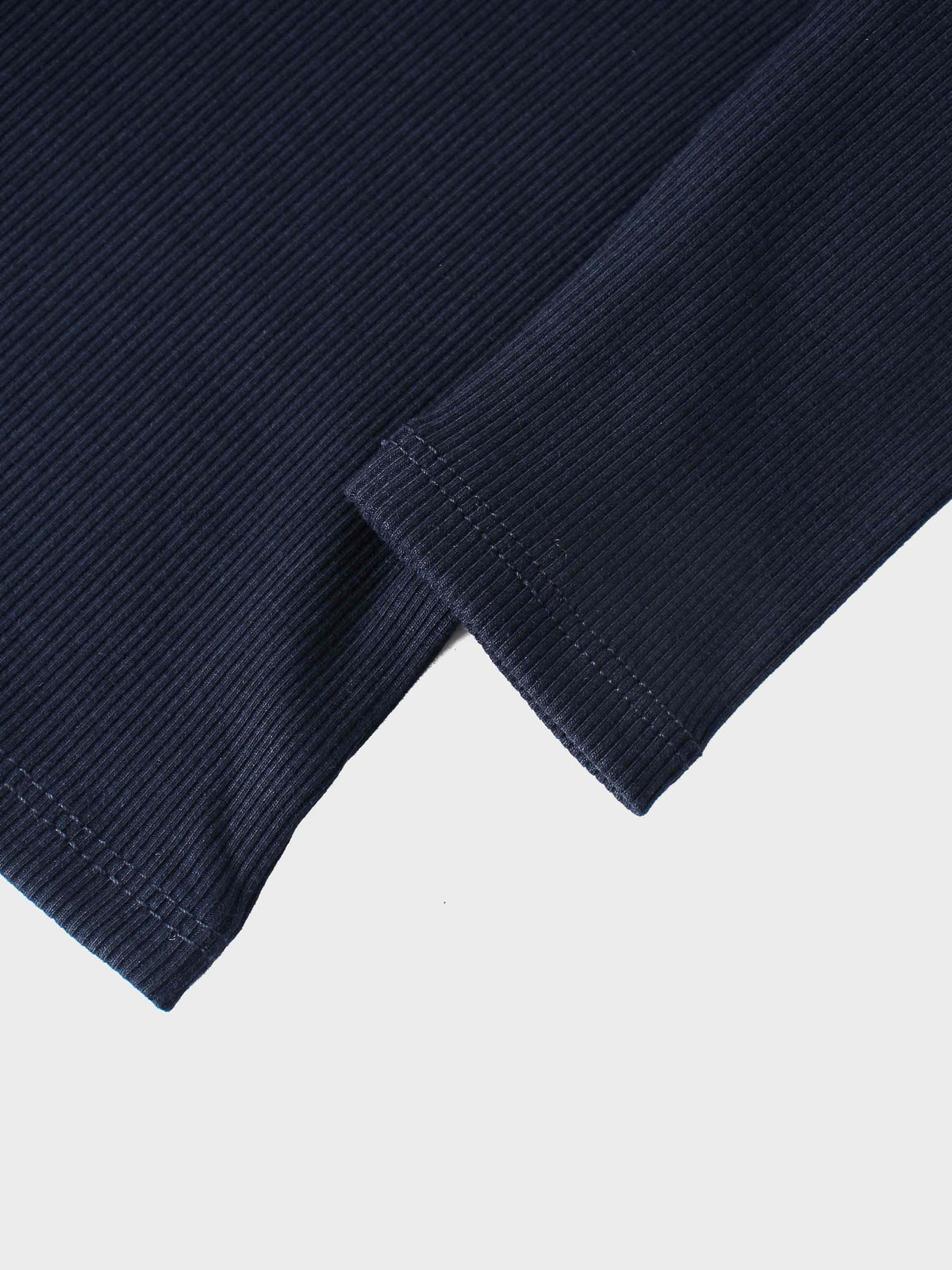 Thin ribbed cardigan in navy by Adee, unisex dressy top.
