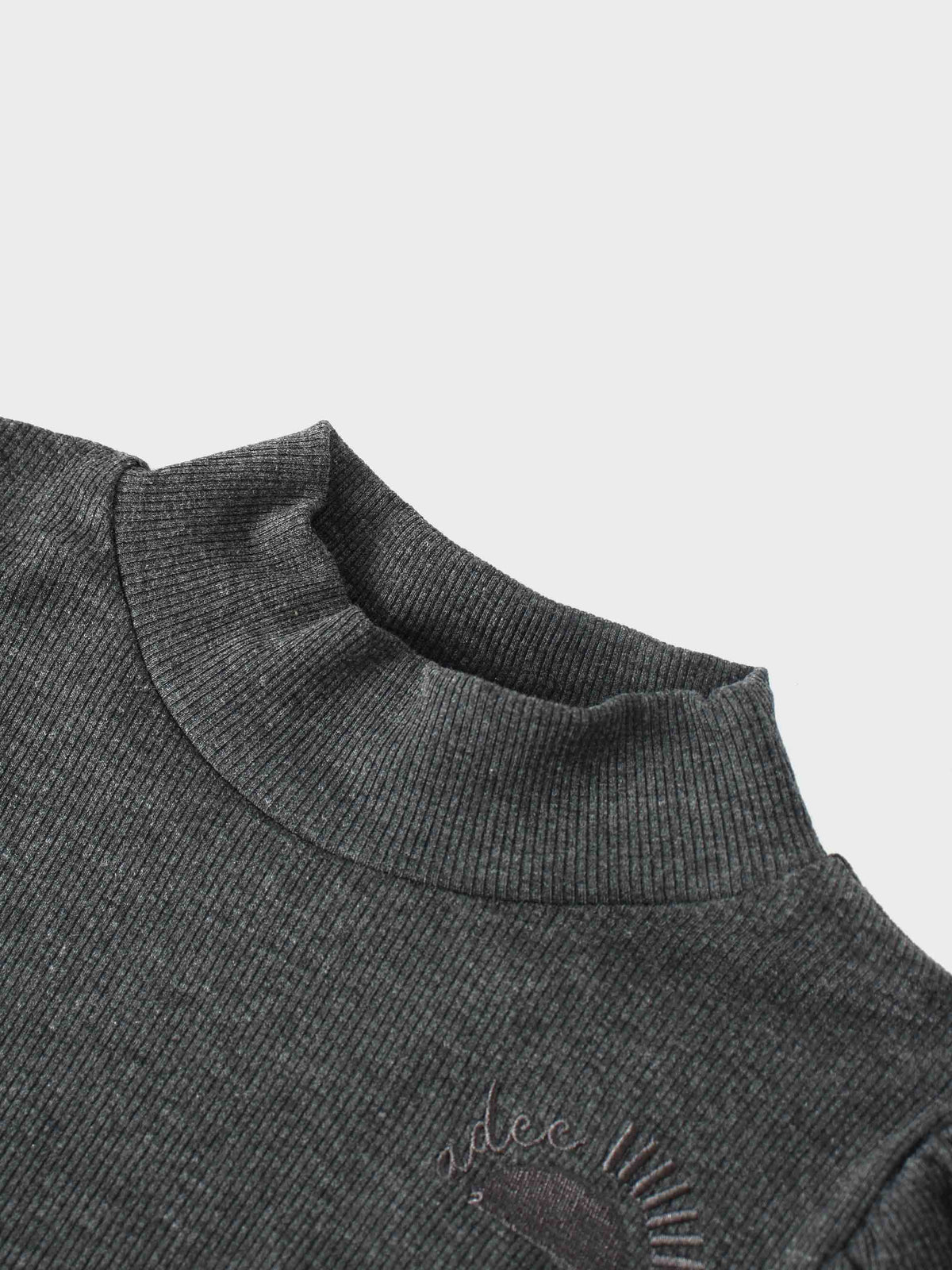 Grey ribbed knit mock-neck shirt for kids with subtle chest embroidery.