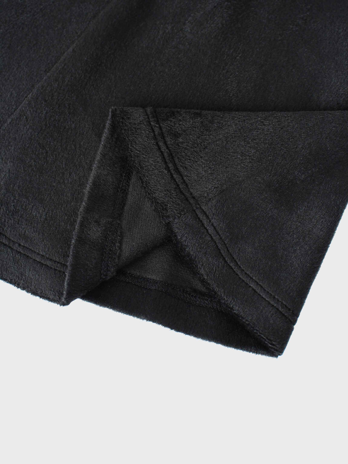 Black velour six-panel circle skirt hem detail.