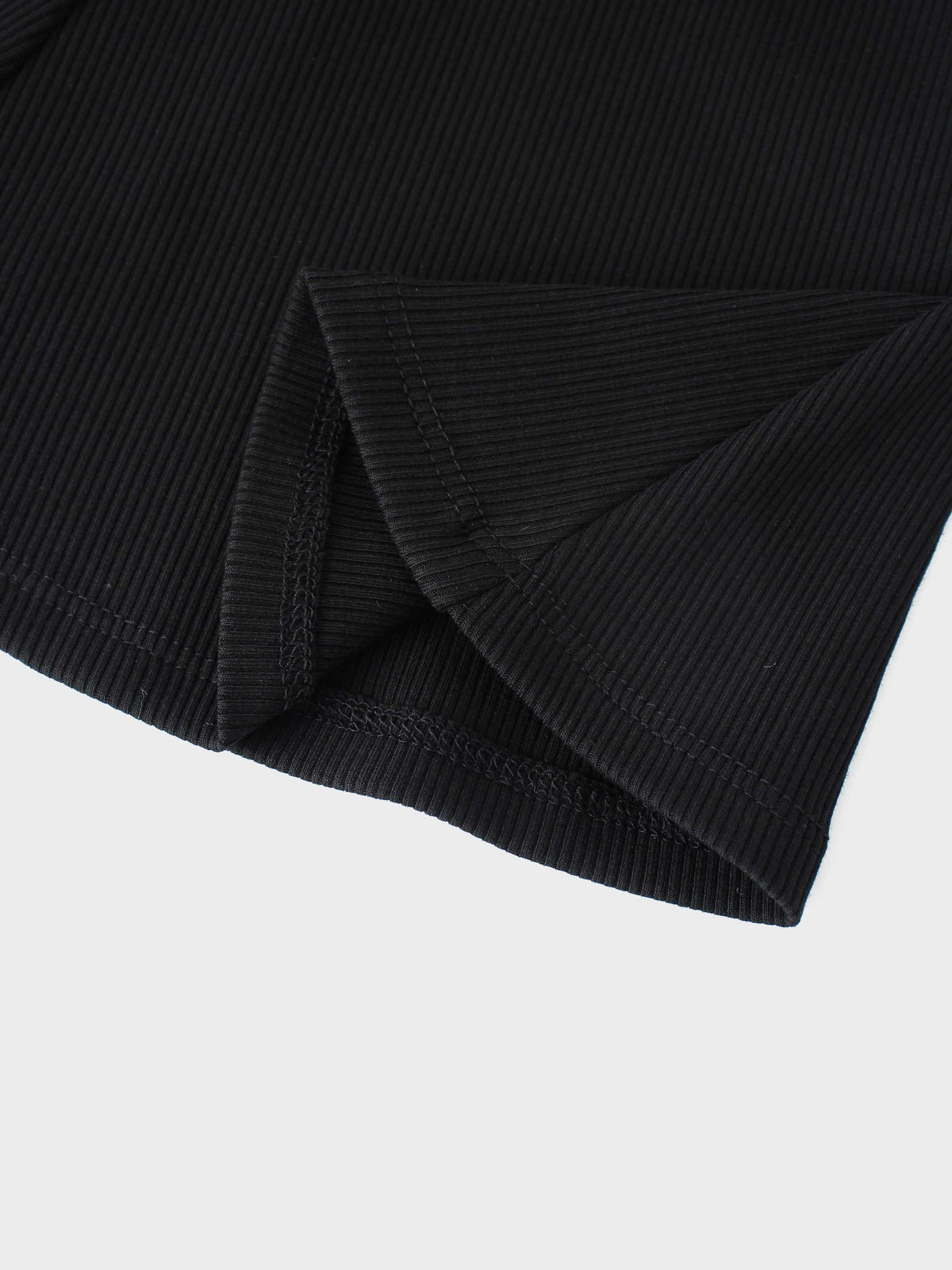 Six-panel black ribbed skirt for girls with elastic drawstring waist and flared silhouette.